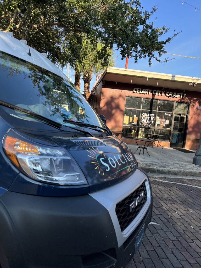 Solcium Solar's van outside of Celery City Craft in Historic Downtown Sanford, Florida