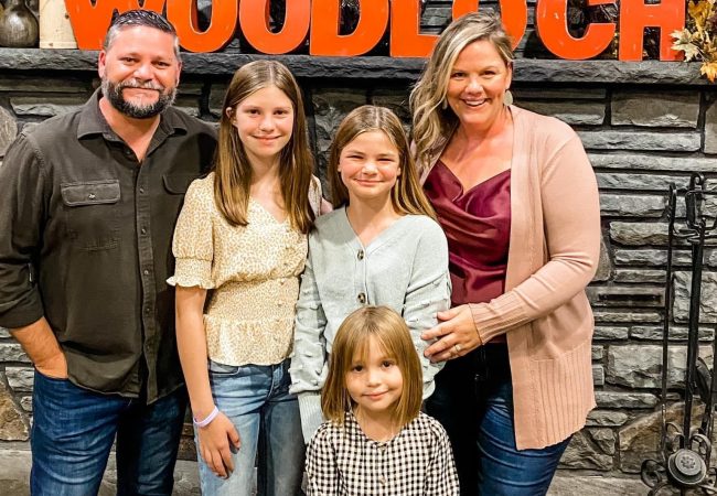 Solcium Solar's Chief Strategy Officer, Founder & Owner, Gustavo Panosso poses with his wife and three daughters.